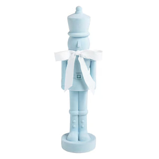 Mud Pie blue flocked nutcracker sitter with cotton bow at the neck