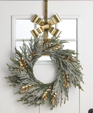 Side view of Mud Pie gold bow wreath holder that hooks over doors