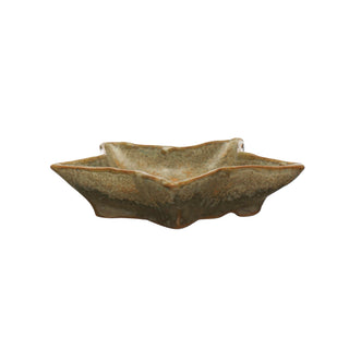 Small stoneware star shaped plate in reactive green glaze, each one unique