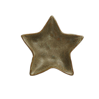 Close-up of the reactive green glaze on 4 inch stoneware star plate
