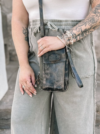 Back view of Bed Stu Alelike black leather phone case bag