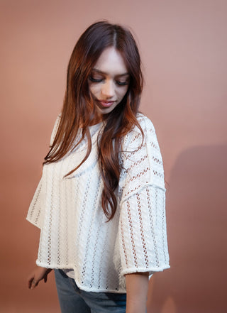 Side view of Allie Rose off-white pointelle knit sweater