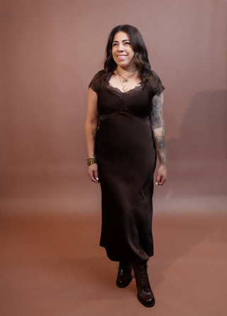 Chocolate truffle satin midi dress with lace-trim V-neck, puff sleeves and empire waist