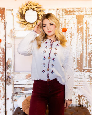 Cable knit cardigan with floral embroidery, contrast stitching and button-down front