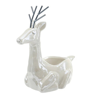 Side view of small deer-shaped bowl showing sculptural silhouette
