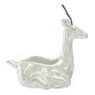 Close-up of reactive pearl glaze finish on small ceramic deer bowl