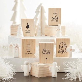Styled view of ceramic tree figurine as a holiday keepsake gift