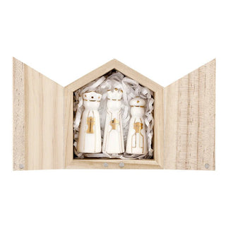 Detail view of gold foil accents on small ceramic kings figurine