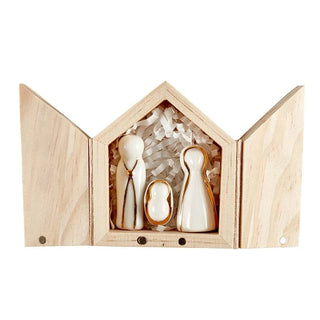 Close-up of gold foil embellishment on Holy Family ceramic figurine