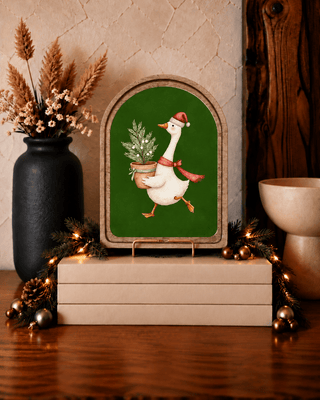 Christmas goose arch framed art print with light green tones for holiday shelf decor