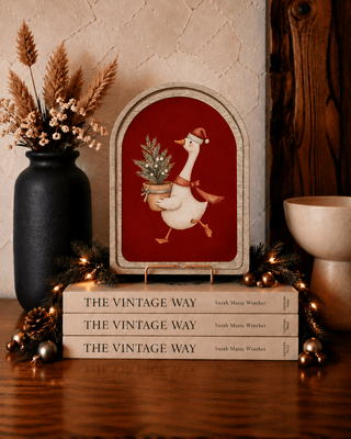 Christmas goose arch framed art in red with stained wood frame