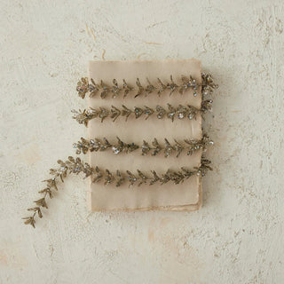 Champagne faux boxwood garland with subtle glitter for mantel decor