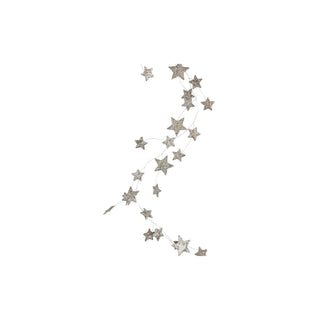Styled view of glitter star garland draped as a festive holiday accent