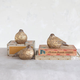 Distressed gold songbird figurines shown in three styles