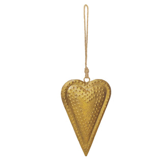 Detail view of embossed antique gold heart bell with natural jute string