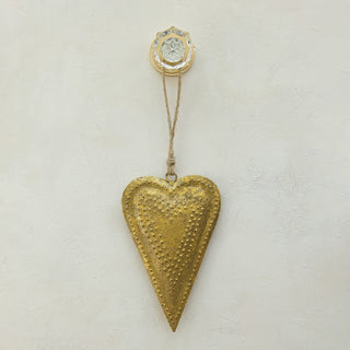 Embossed metal heart-shaped bell in antique gold finish with jute hanging string