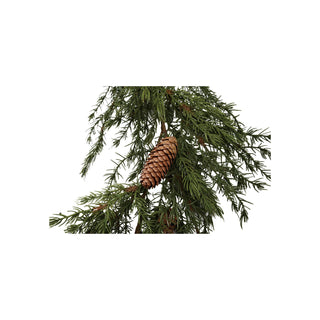 Detail view of lifelike faux cedar branches on holiday garland