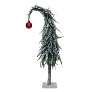Snow-dusted faux evergreen tree with red ball ornament on wood base