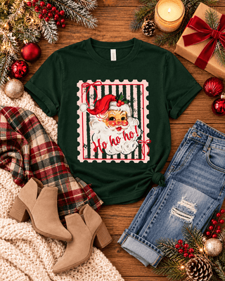 Festivitees Coquette Santa Christmas graphic tee in hunter green with bows and retro Santa