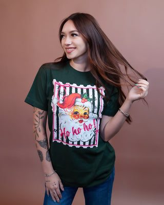 Back view of hunter green coquette Santa Christmas graphic tee