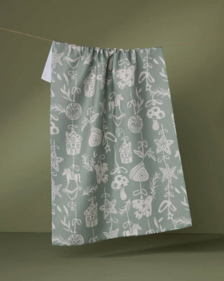Cozy Ornaments holiday print tea towel made from recycled materials