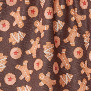 Styled view of Holiday Cookies print tea towel in quick-drying recycled woven fabric