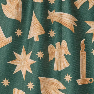 Styled view of Noel Icons holiday tea towel