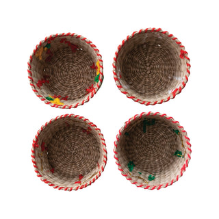 Styled view of small woven holiday basket filled with treats