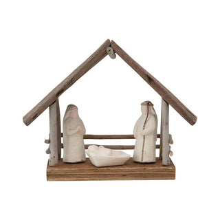 Handmade driftwood and paper mache nativity set on a wood base