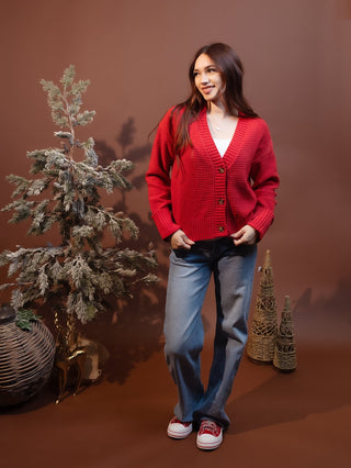 Full-length view of Hem & Thread cranberry cardigan