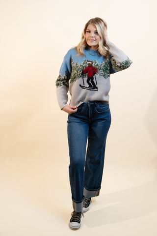 Full-length view of Hem & Thread ski bear sweater, a cozy winter layer