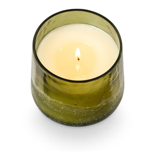 Styled view of Balsam and Cedar holiday candle