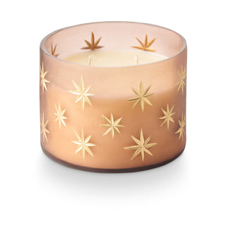 Woodfire candle in frosted glass vessel etched with gold stars