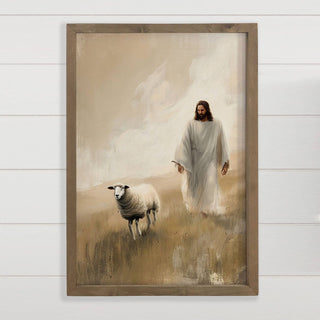 Framed 12x18 canvas art of Jesus walking with a lost sheep in a golden field