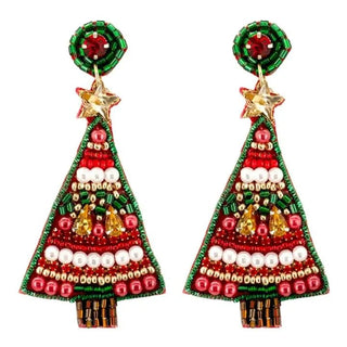 Close-up of colorful beadwork on Christmas tree dangle earrings