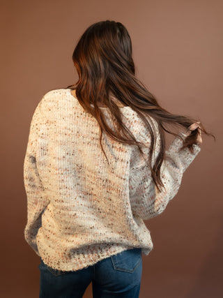 Listicle ecru confetti knit sweater shown from another angle