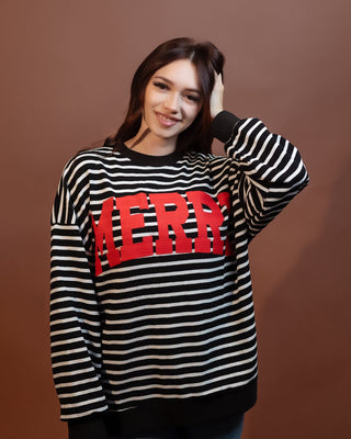 Side view of relaxed fit striped knit top in soft stretch fabric