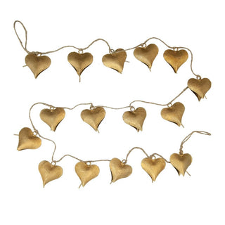 Gold metal heart-shaped bell garland strung on natural jute cord