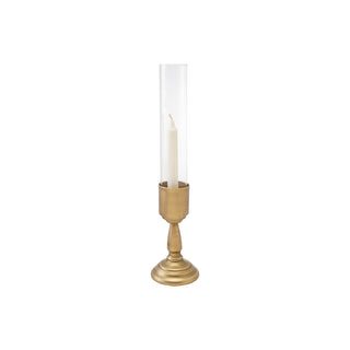 Close-up of brushed gold finish on turned iron taper holder base