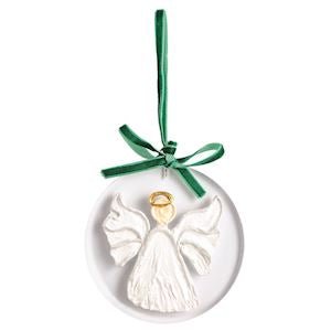 Mud Pie acrylic angel ornament that glows on a lit tree
