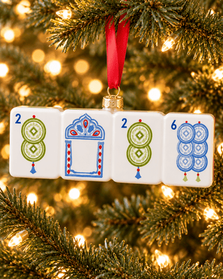 Fortune Coin mahjong ornament in soft blue and green with delicate tassel accents