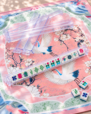 Set of four clear acrylic mahjong racks with attached pushers