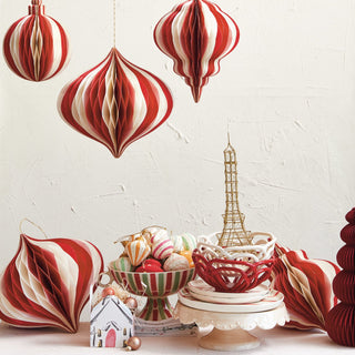 Cream and red paper honeycomb Christmas ornament with gold glitter edge