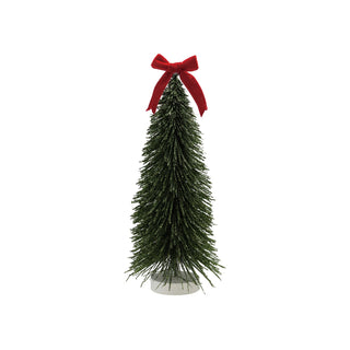 Green glitter bottle brush tree with red velvet bow on wood base
