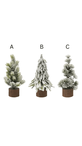 Close-up of frosted polypropylene needles on snow-tipped LED tabletop tree