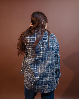 POL indigo plaid shirt styled open over a tank with denim