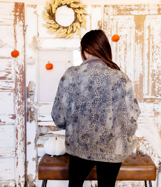 Detail view of bead embellishments on washed denim