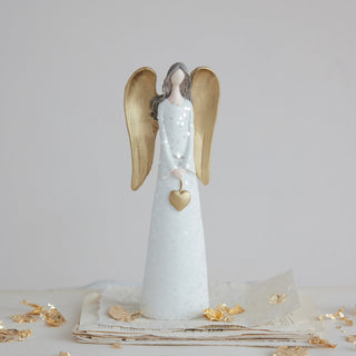 Alternate view of handcrafted white and gold resin angel with heart