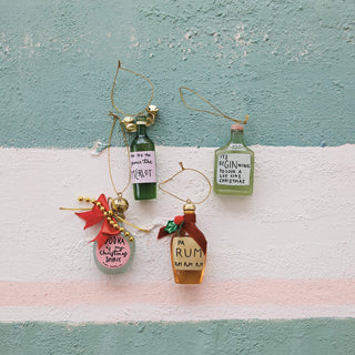 Bottle-shaped holiday cocktail ornaments shown in four assorted styles