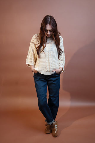 Detail view of Risen textured barrel jeans in dark harvest